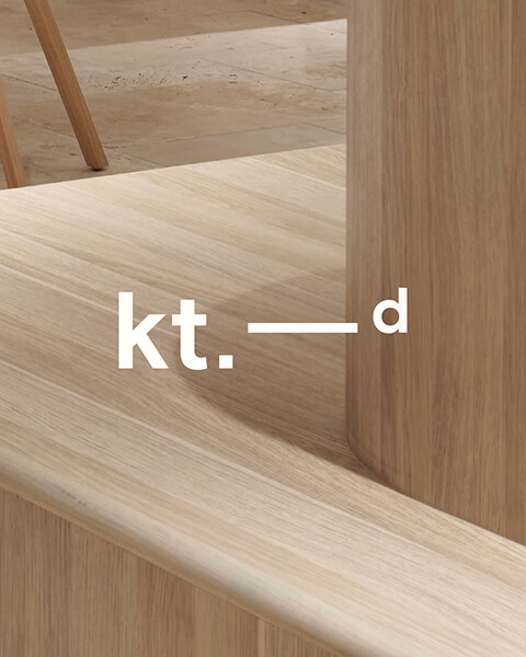 kristina tarle designs logo placed over a photo of a pine bench interior