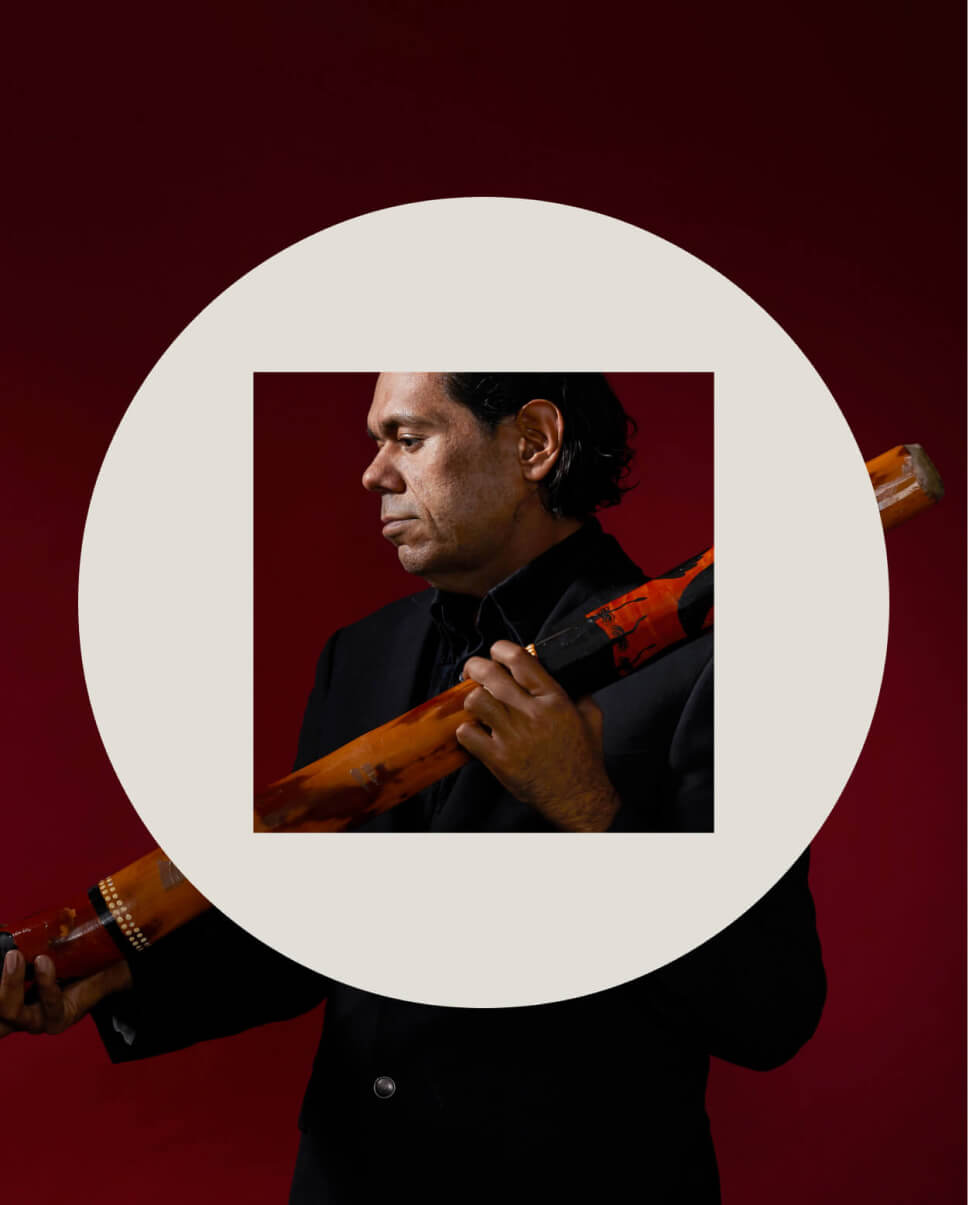 vector icon placed over image of William Barton holding a didgeridoo